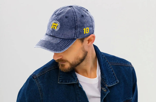 Blue denim baseball cap with yellow embroidered logo and number ’10’’ on the side